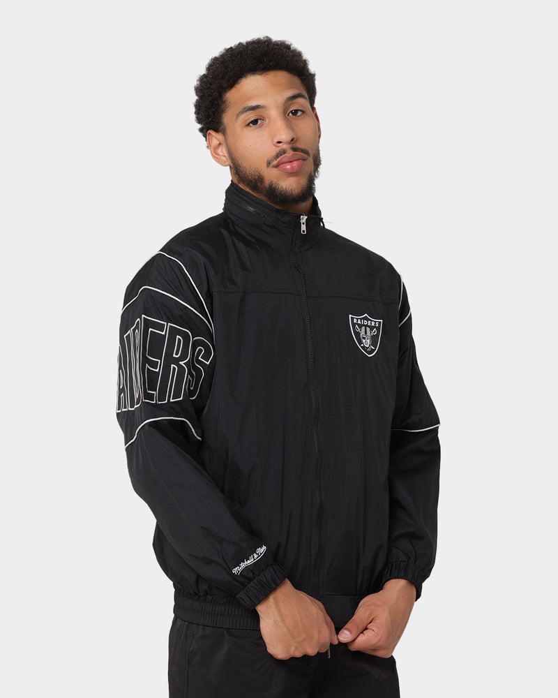 Raiders varsity jacket hot sale mitchell and ness